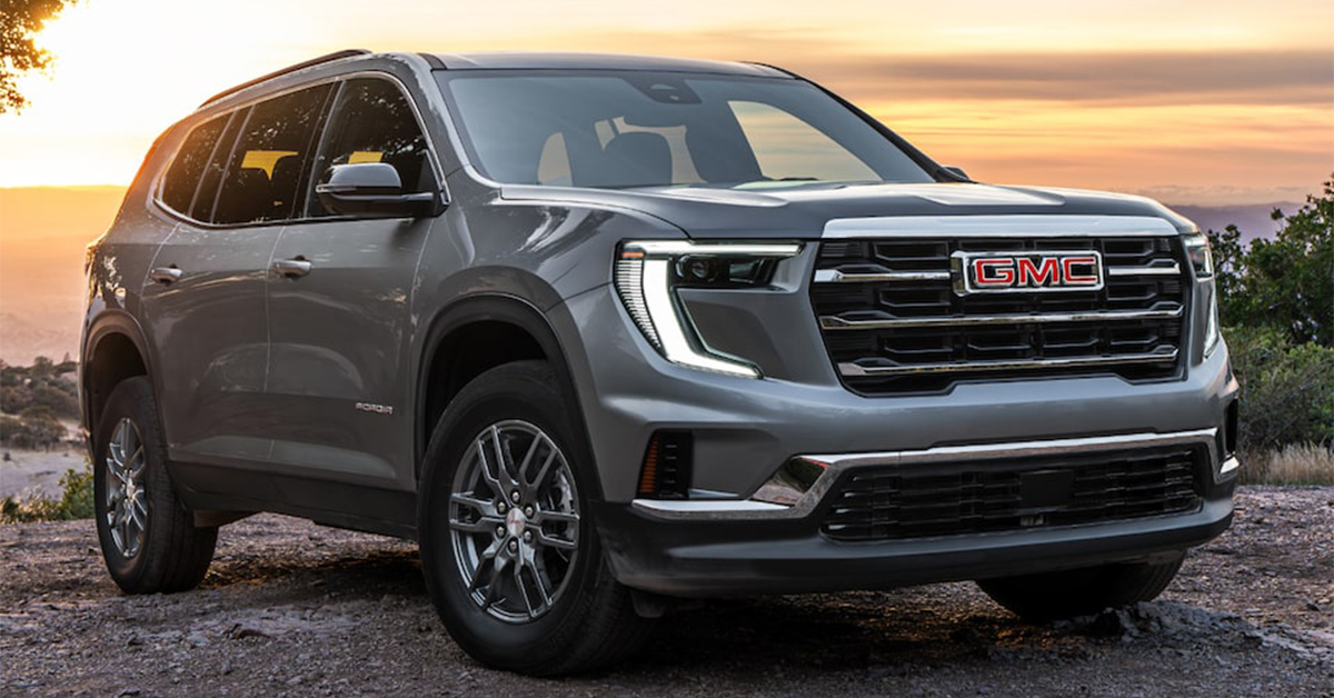 2025 GMC Acadia driving on the highway