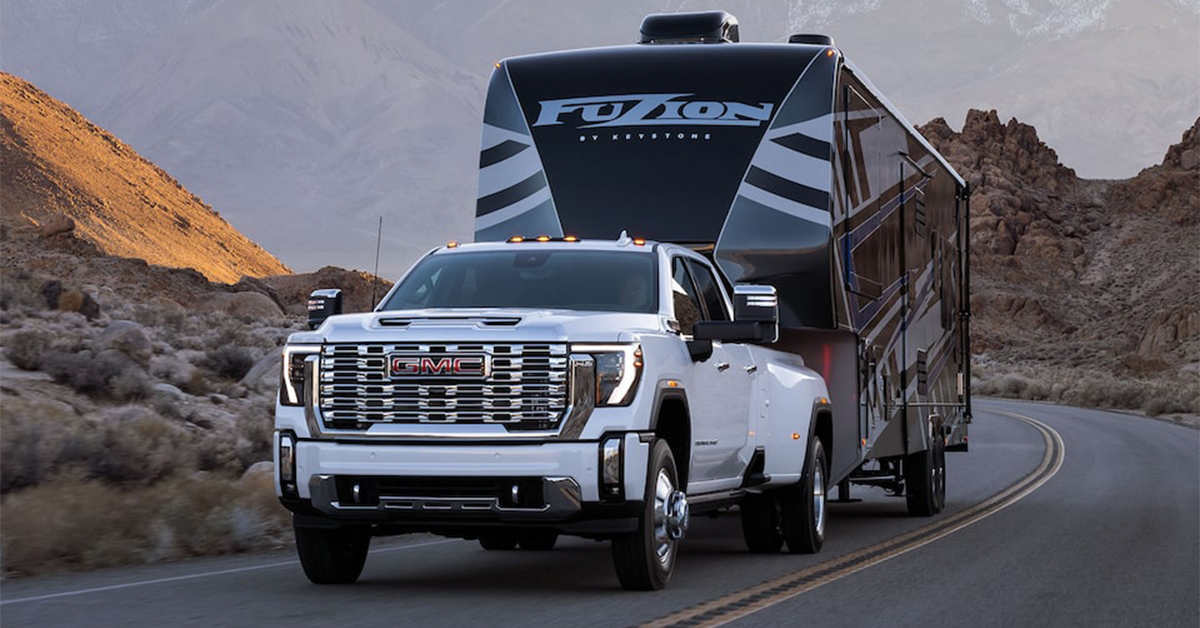 2025 GMC Sierra 2500 HD towing a large trailer